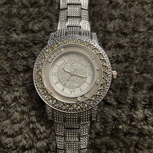 Men’s Stainless Steel “Bell&More” watch.